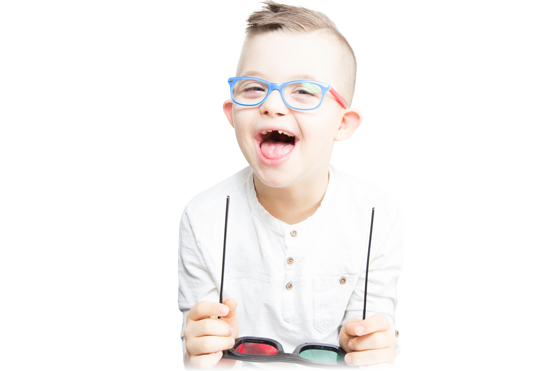 Young boy smiling holding 3d glasses.