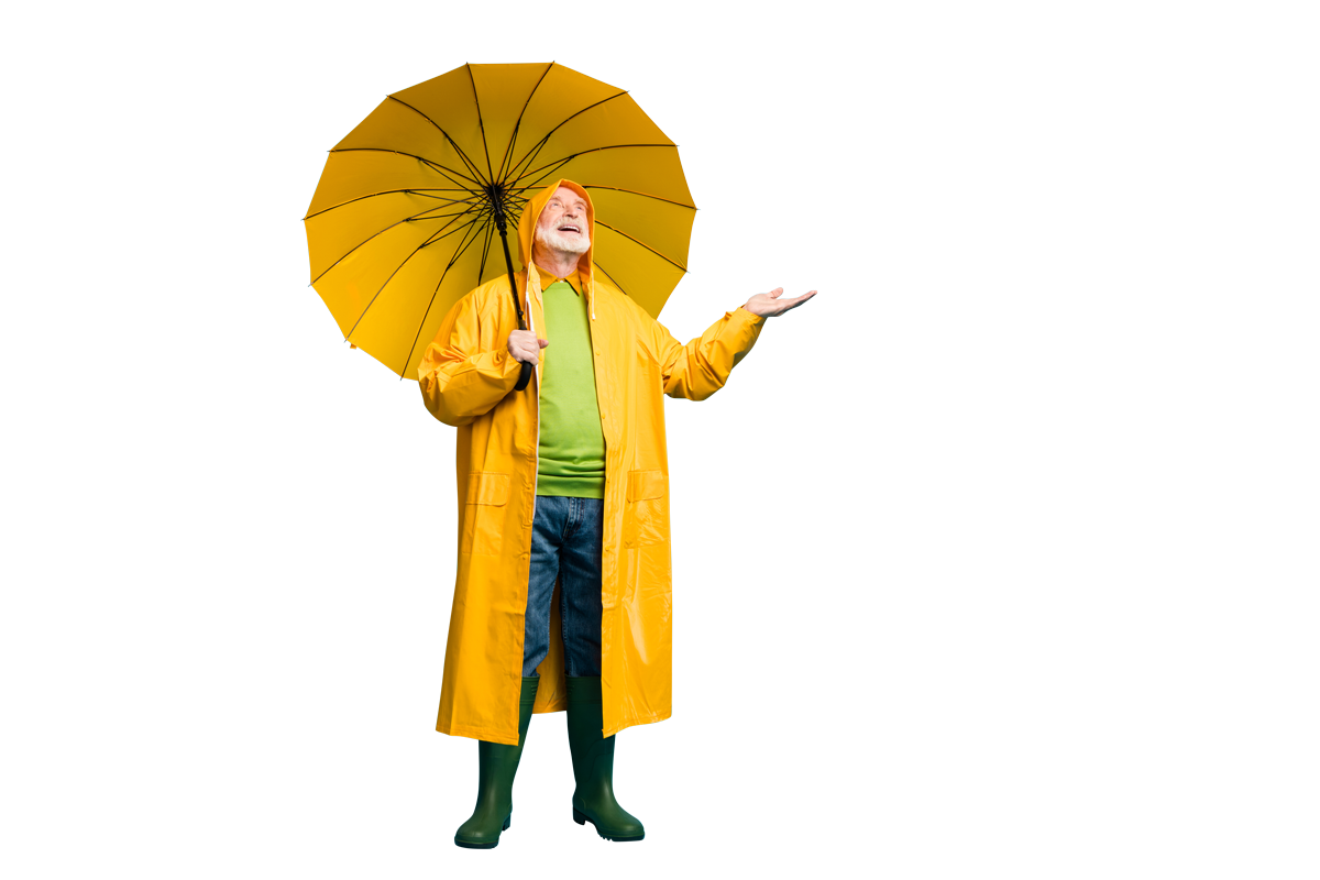 Older gentleman, wearing yellow rain coat and yellow umbrella, smiling and holding hand out.